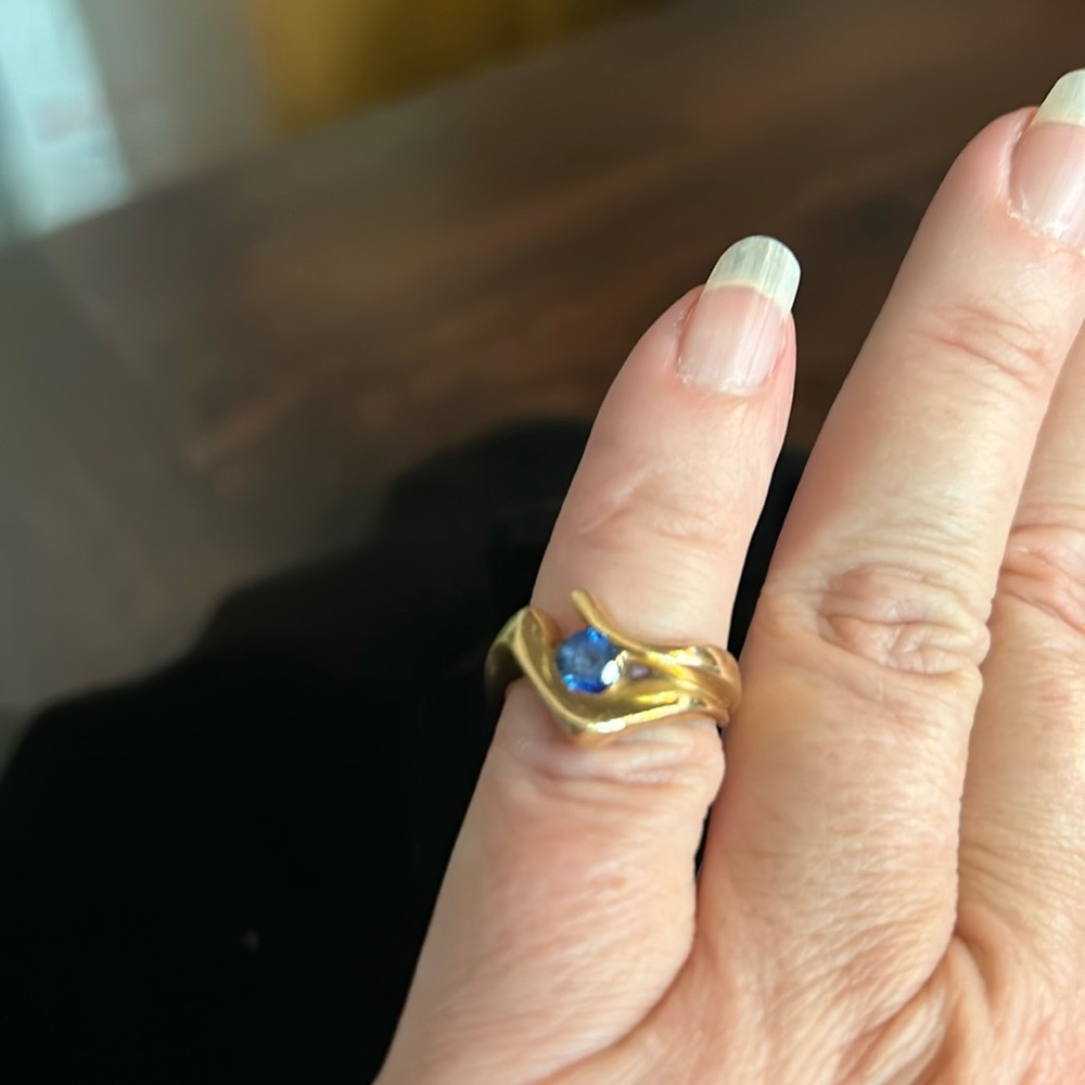 14k yellow gold and sapphire ring.
